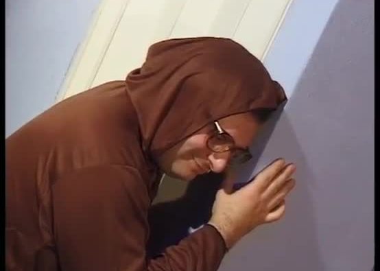 Dirty nun jerks off her pussy while she's spied on the keyhole